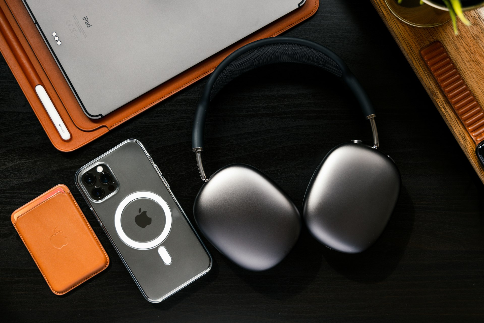 a pair of headphones sitting next to a laptop